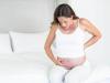 Болит низ живота при беременности: основные причины